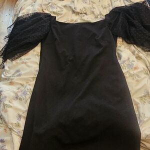Elegant Black Dress with Sheer Sleeves